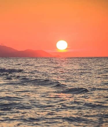 Boat sunset experience