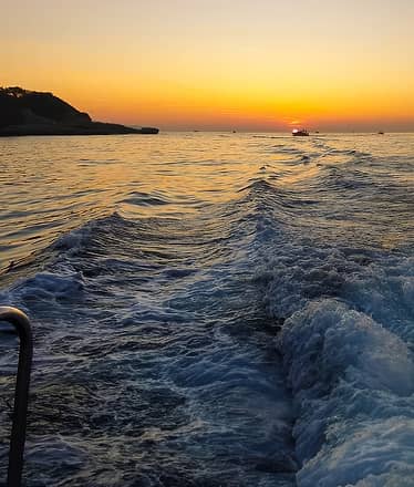 Esperienza in barca al tramonto a Sorrento con limoncello tasting