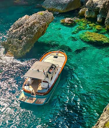 Tour privato in barca di Capri e Sorrento
