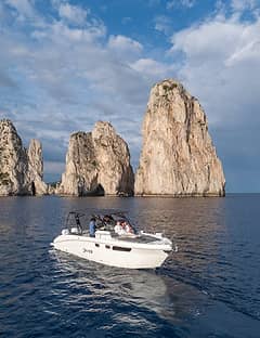 Private Capri Boat Tour: Explore Sea Caves, Faraglioni & Hidden Bays