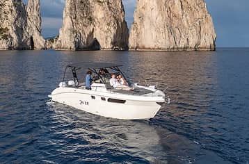 Private Capri Boat Tour: Explore Sea Caves, Faraglioni & Hidden Bays