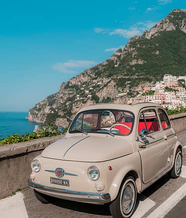 Positano da sogno in Fiat 500 storica: tour fotografico esclusivo tra scorci segreti