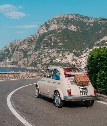 Positano da sogno in Fiat 500 storica: tour fotografico esclusivo tra scorci segreti