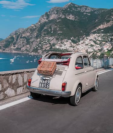 Positano da sogno in Fiat 500 storica: tour fotografico esclusivo tra scorci segreti