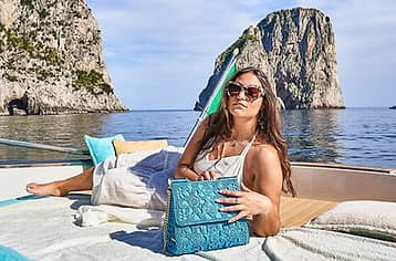 Transfer by boat to Capri beach clubs