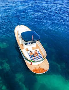 Capri aboard a private boat from Naples or Sorrento