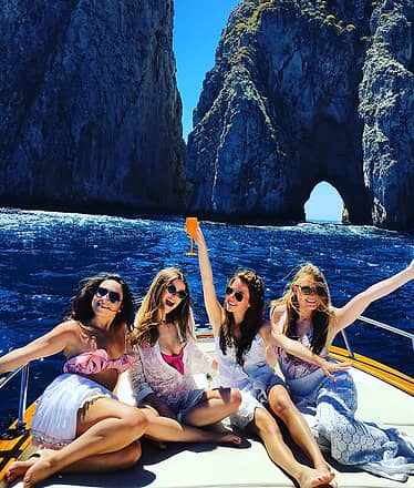 Capri aboard a private boat from Naples or Sorrento