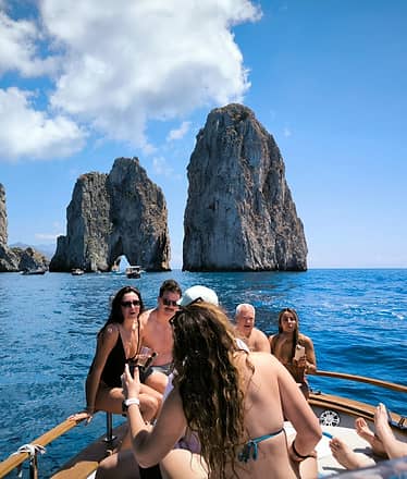 Capri and Blue Grotto Private Boat Tour with aperitivo and Swim