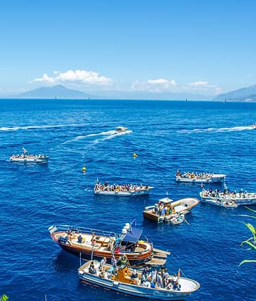 Blue Grotto and Capri Boat Tour with Aperitivo Swim and Snorkel