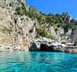 Mezza giornata in barca a Capri: grotte, Faraglioni e snorkeling