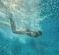 Mezza giornata in barca a Capri: grotte, Faraglioni e snorkeling