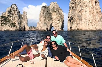 Full-day boat tour of Capri: explore sea caves and breathtaking views