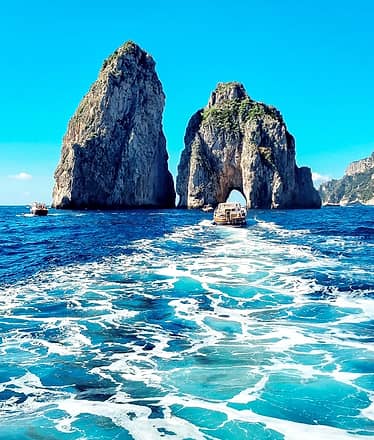 Capri boat tour: stunning caves, crystal waters & the legendary Faraglioni
