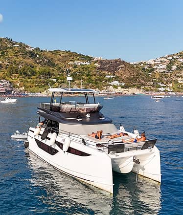 Boat Tour in Capri: 8-Hour Exclusive Experience with Caves, Faraglioni Rocks and Crystal-Clear Sea