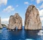 Boat Tour in Capri: 8-Hour Exclusive Experience with Caves, Faraglioni Rocks and Crystal-Clear Sea