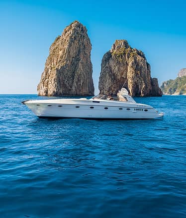Dream Private Boat Tour to Capri: Grottos, Faraglioni and Blue Sea