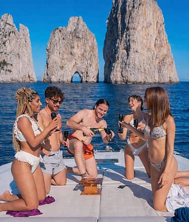 Dream Private Boat Tour to Capri: Grottos, Faraglioni and Blue Sea