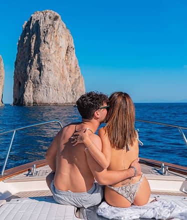 Dream Private Boat Tour to Capri: Grottos, Faraglioni and Blue Sea