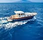 Premium private boat tour to Amalfi and Positano with islands, villages and sea views