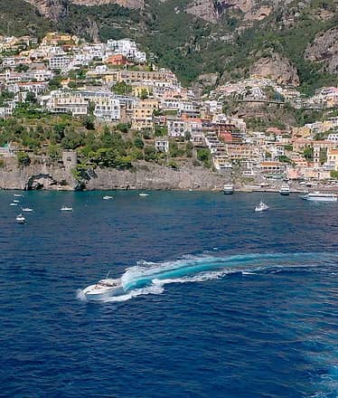 Premium private boat tour to Amalfi and Positano with islands, villages and sea views