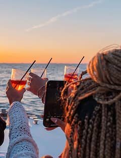 Sunset Boat Tour along the Sorrento Coast with Aperitif and Golden Views