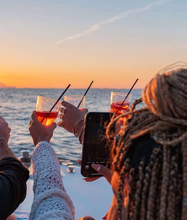 Sunset Boat Tour along the Sorrento Coast with Aperitif and Golden Views