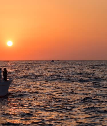 Tour in barca al tramonto da Sorrento