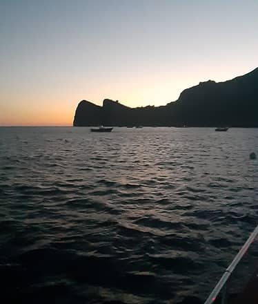 Sorrento by Night Private Sunset Cruise with Dinner in Nerano