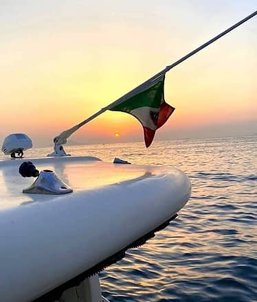 Sorrento by Night Private Sunset Cruise with Dinner in Nerano