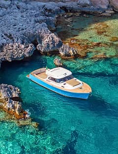 Giro dell'isola di Capri in barca privata: Full Day Experience