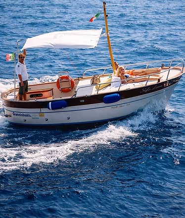 Capri Sunset Boat Tour with Champagne and Stunning Coastal Views