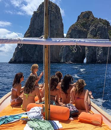 Sunset Sail with Cocktails beneath the Faraglioni