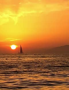 Sunset Sail with Cocktails beneath the Faraglioni