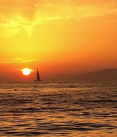 Sunset Sail with Cocktails beneath the Faraglioni