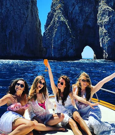 Sunset Sail with Cocktails beneath the Faraglioni