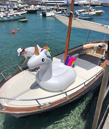 Capri in gozzo , swimming and Faraglioni Rocks