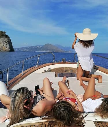 Capri from the sea: tour of the island on a traditional gozzo